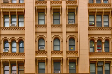 Windows texture of a yellow apartment building in Adelaide (South Australia)