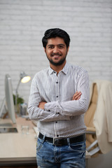 Fototapeta premium Smiling young businessman
