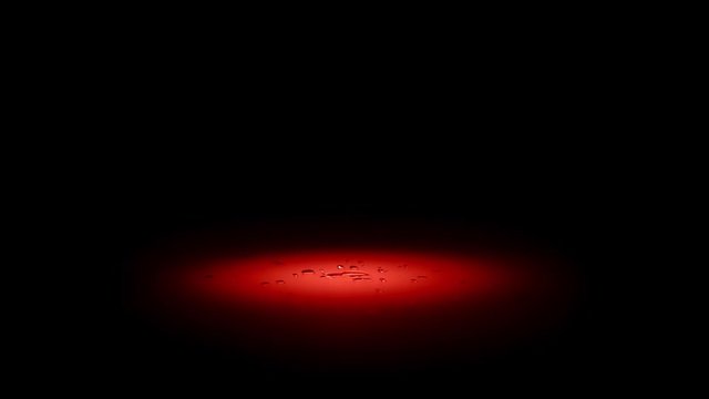 Water drops in red spotlight on black background in morgue. Crime scene of liquid droplets in blood
