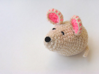 white handmade mouse crocheted