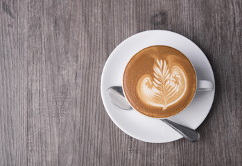 latte or Cappuccino, coffee cup top view on table in cafe. copy space