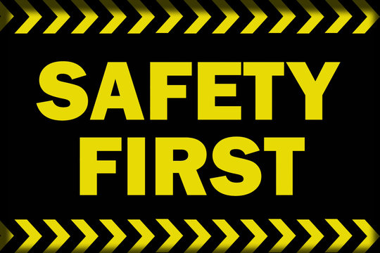 Safety first word on black background