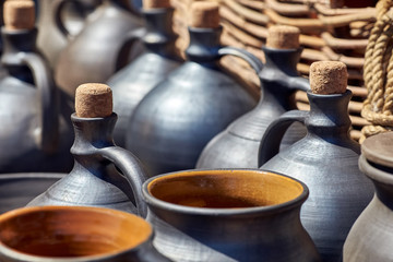 A set of jugs, bottles and pots for wine or oil.