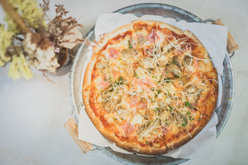 pizza served on marble table