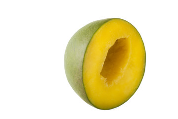 half of mango isolated on white background