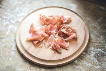 Jamon on wooden background