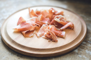 Jamon on wooden background
