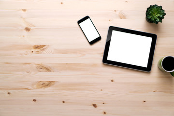 Knolling business desk top view with blank tablet and smartphone