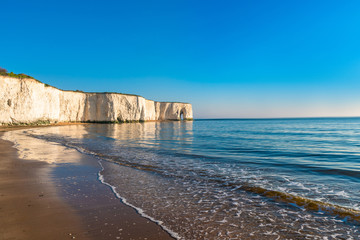 View of white chalk cliffs and beach in Kingsgate Bay, Margate, East Kent, UK