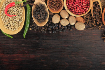 spices frame on wooden background