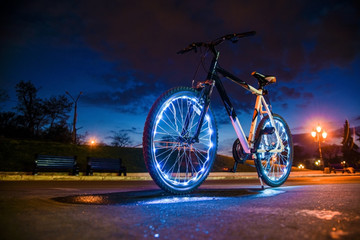 bicycle with luminous wheels © Alexey Achepovsky