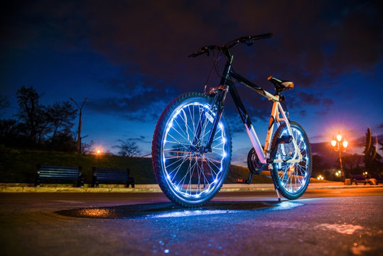 Fototapeta bicycle with luminous wheels