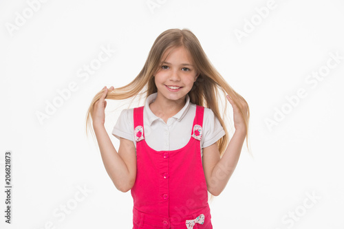 Girl On Smiling Face Posing With Long Hair Isolated On