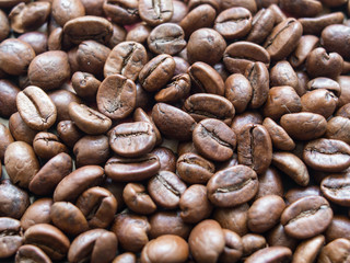 Roasted coffee beans macro. Shallow DOF, selective focus.