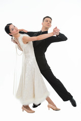 ballroom dance couple in a dance pose isolated on white