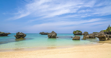 Fototapeta na wymiar Beautiful ocean and rocks at a private island in Okinawa, Japan.