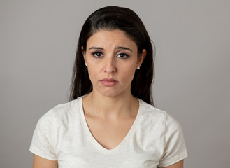 Human expressions, emotions. Young attractive woman with a sad face, looking depressed and unhappy