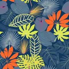 Seamless pattern from tropical leaves. multi-colored tropical leaves pattern