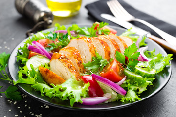 Salad with chicken meat. Fresh vegetable salad with chicken breast. Meat salad with chicken fillet and fresh vegetables on plate