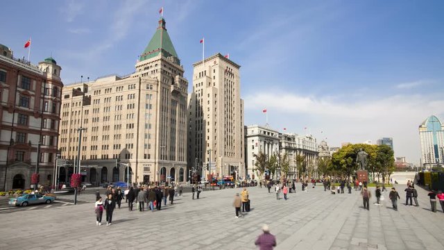 Tourists and local people on promenade, by the Huangpu waterfront, the Bund, Shanghai, China, Asia, T/Lapse