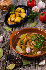 Fried round sausages