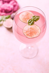 Pink cocktail with fig