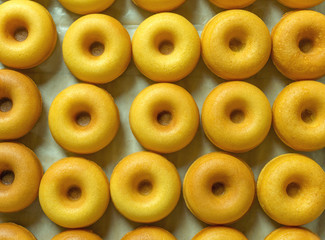 Top view image of group of baked butter milk donuts