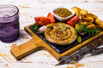 Fried round sausages