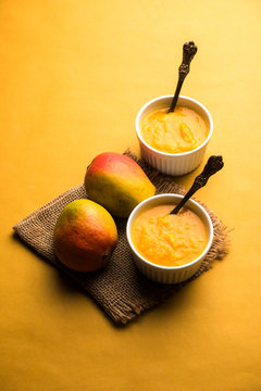 Mango Pulp / Aam rus or Ras served in small bowls, selective focus