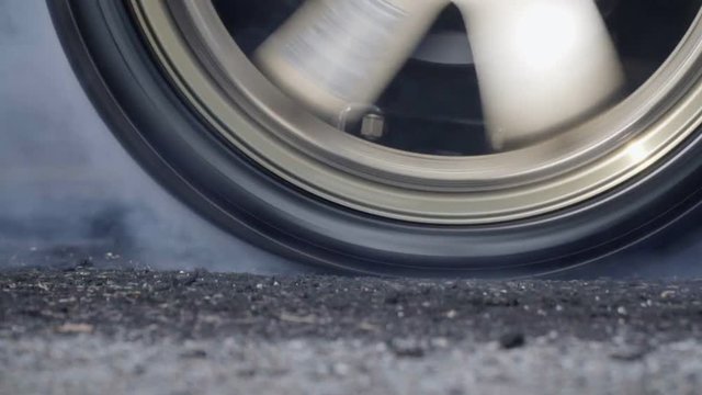 Slow motion ,Drag racing car burn tire at start line