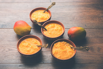 Mango Pulp / Aam rus or Ras served in small bowls, selective focus