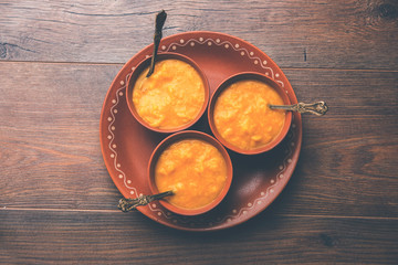 Mango Pulp / Aam rus or Ras served in small bowls, selective focus