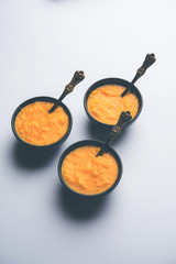 Mango Pulp / Aam rus or Ras served in small bowls, selective focus