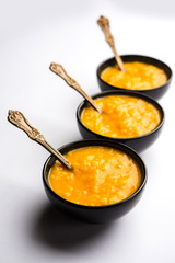 Mango Pulp / Aam rus or Ras served in small bowls, selective focus