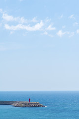 Red lighthouse in Jeju island South Korea.