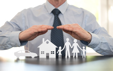 Concept of family, home and car insurance