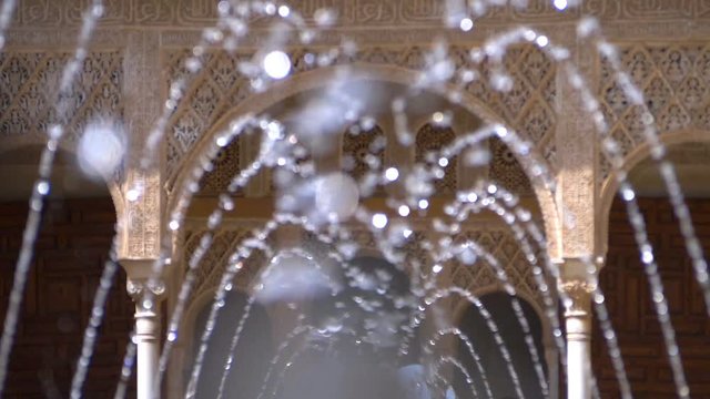  April 2018, Granada,Spain - Fountain pouring water  in Alhambra Palace
