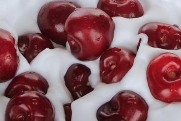 red cherry in white cream