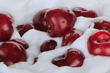 red cherry in white cream