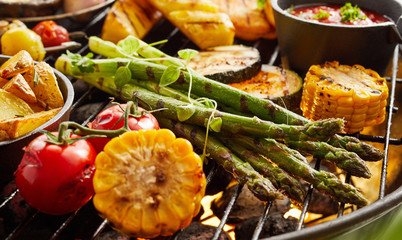 Healthy fresh summer vegetables grilling on a BBQ