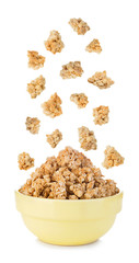 Falling cereal crisps close-up isolated on white background.