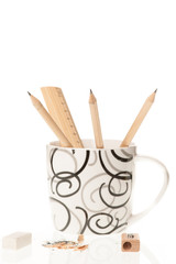 Pencil ruler sharpener and eraser isolated over white background