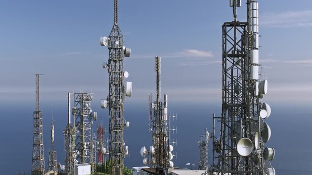 aerial view of telecom antennas telecommunications towers on mountaintop