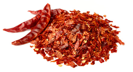 dried red pepper flakes isolated on white