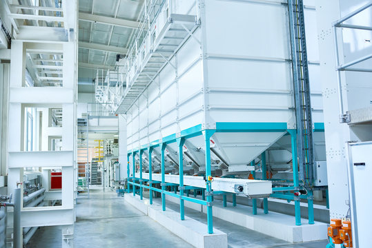 Background image of interior of clean production workshop at modern factory, machine units lining long hall, copy space