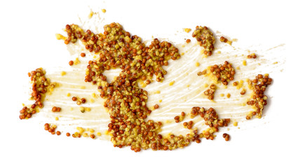 Mustard spread over white background