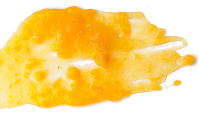 Apricot jam spread isolated over white background