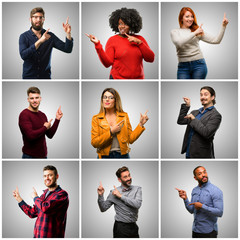 Group of mixed people, women and men pointing away side with fingers