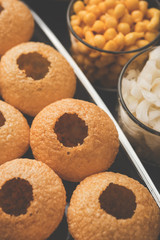 Pani Puri OR Golgappa is a popular Indian Chat menu, selective focus
