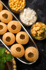 Pani Puri OR Golgappa is a popular Indian Chat menu, selective focus